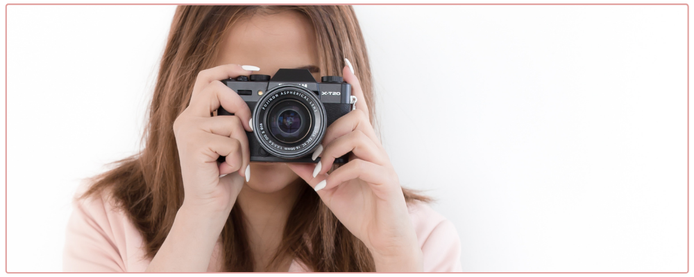 woman taking photograph.