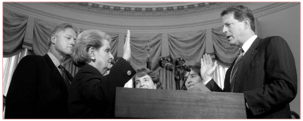 Inspirational Prompts for Christmas, woman drinking hot chocolate and writing in her journal with a candy cane as decoration