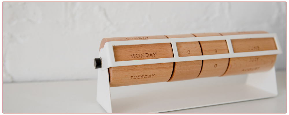 Woman at her desk feeling overwhelmed.