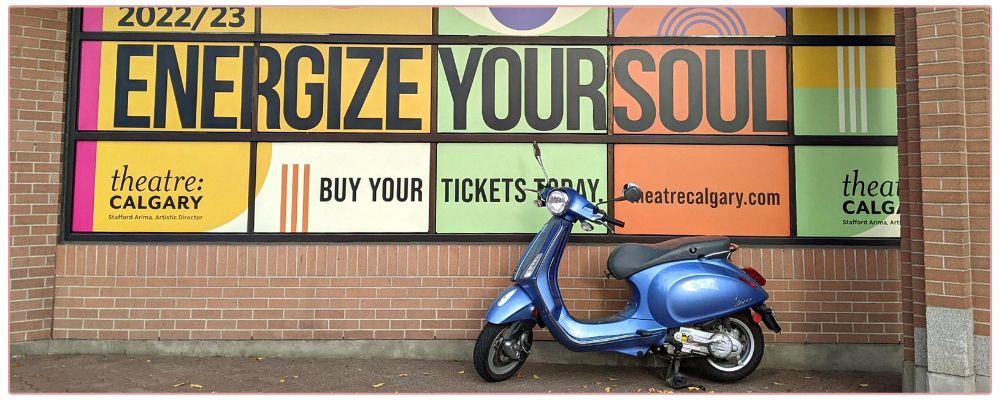 Inspirational Prompts for Christmas, woman drinking hot chocolate and writing in her journal with a candy cane as decoration